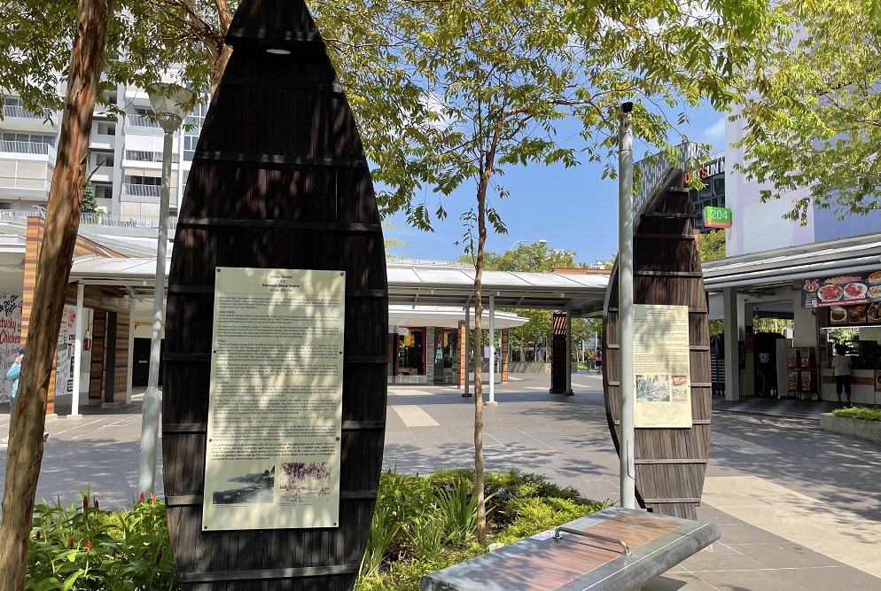 signboards at bedok central detailing development over the years